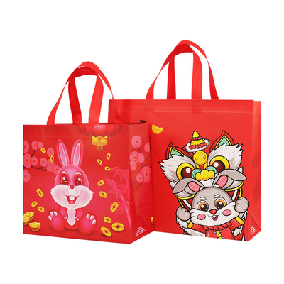 Las bolsas de asas reutilizables laminadas reciclan bolsas no tejidas de polipropileno para Año Nuevo