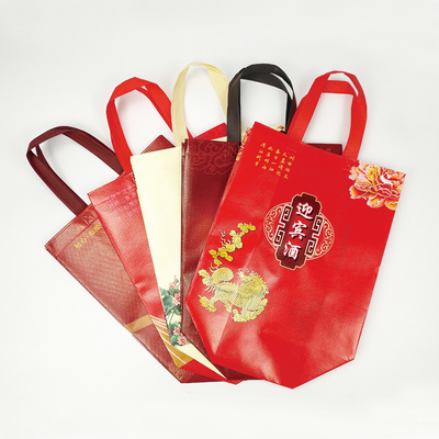 Bolsas de asas para envolver regalos con logotipo impreso personalizado a prueba de agua Bolsa para botella de vino con asa troquelada
