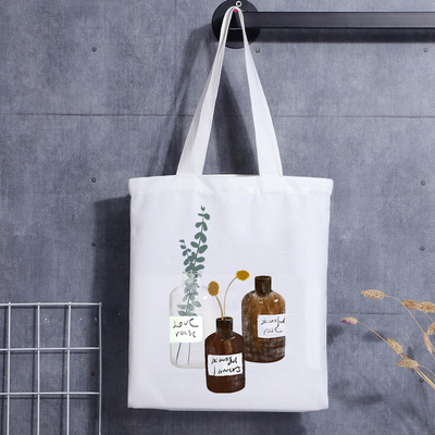 La mini bolsa de algodón personalizada de lona imprimió la bolsa de asas de lona con asa de bolso