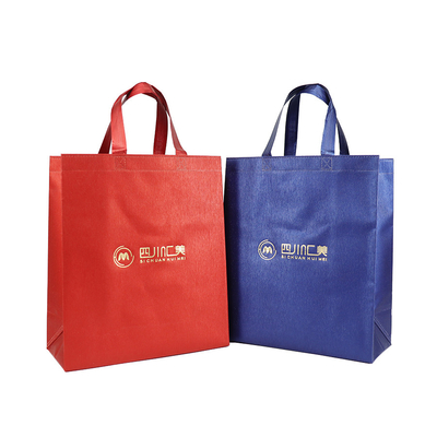 La aduana al por mayor de la chispa del polipropileno de la bolsa de asas de los bolsos biodegradables no tejidos del regalo imprimió el bolso que hacía compras no tejido reutilizable