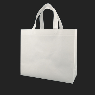 Bolsos de empaquetado amistosos del eco del totalizador del paño que hacen compras para la ropa biodegradable del logotipo de encargo blanco de los paños no tejida cortada con tintas