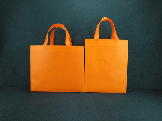 Bolsos que hacen compras no tejidos cortados con tintas biodegradables con los bolsos reutilizables amistosos reciclados impresos aduana del eco del ultramarinos de los logotipos