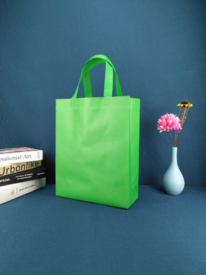Las compras del totalizador reciclan no tejido llevan bolsos de compras reutilizables no tejidos del logotipo de encargo biodegradable verde de los bolsos del bolso