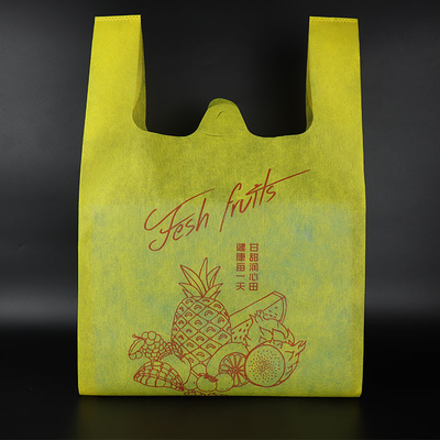 Bolso no tejido reutilizable respetuoso del medio ambiente reciclable amarillo de la camiseta de las compras