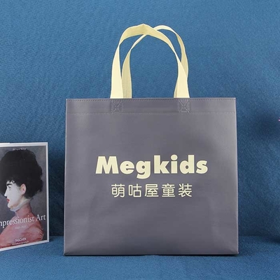 Las compras no tejidas promocionales amistosas de Eco empaquetan el bolso no tejido del zapato 50gsm