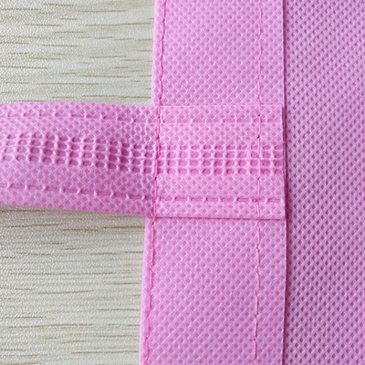 Los bolsos que hacen compras no tejidos rosados plegables del polipropileno 75gsm encogen resistente