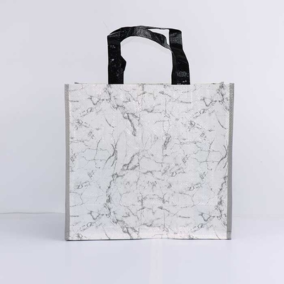 Los bolsos tejidos polipropileno biodegradable que hacen compras encogen resistente