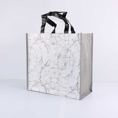 Los bolsos tejidos polipropileno biodegradable que hacen compras encogen resistente