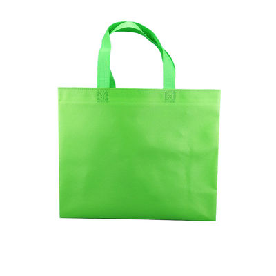 Las compras del totalizador reciclan no tejido llevan bolsos de compras reutilizables no tejidos del logotipo de encargo biodegradable verde de los bolsos del bolso